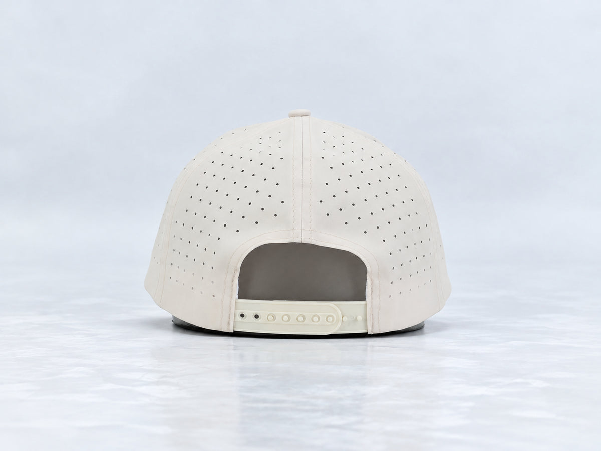 All In Lid Butter hat, back view showing the adjustable snapback strap.