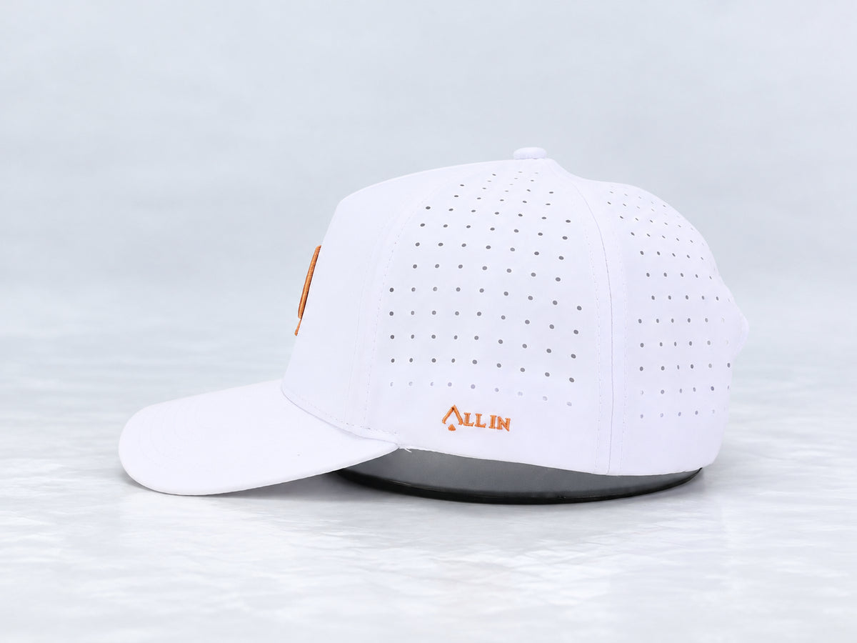All In Lid Creamsicle hat, side profile, in white fabric with a red-edged orange logo.