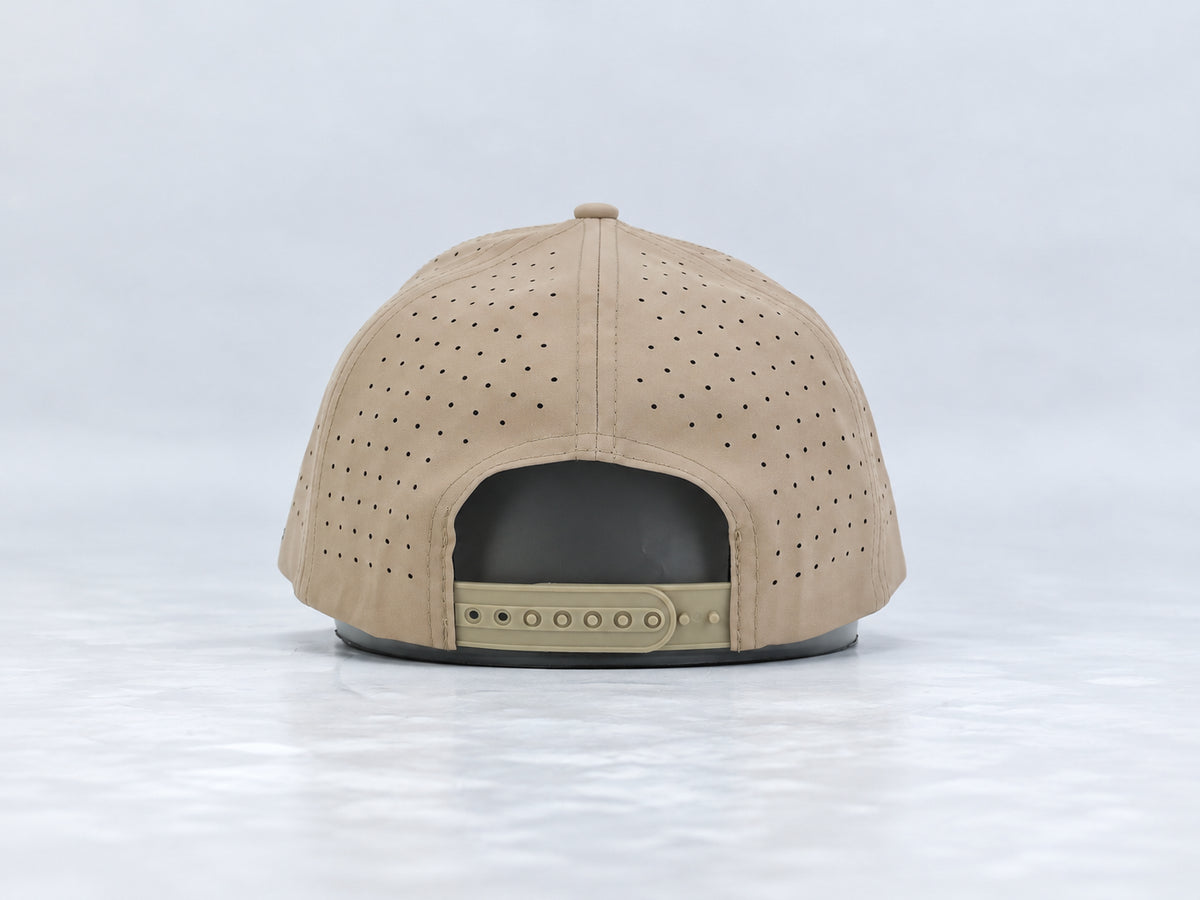 All In Lid Desert Sand hat, back view showing the adjustable snapback strap.