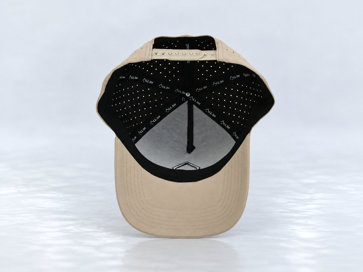 All In Lid Desert Sand hat, underside view showing the interior sweatband and lining.