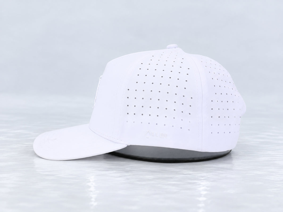 All In Lid White Out hat, side profile, in white fabric with a tonal white logo.
