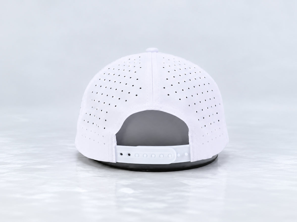 All In Lid OG Reversed white cap, rear view showing the adjustable snapback closure and perforated panels against a pale gray studio background.