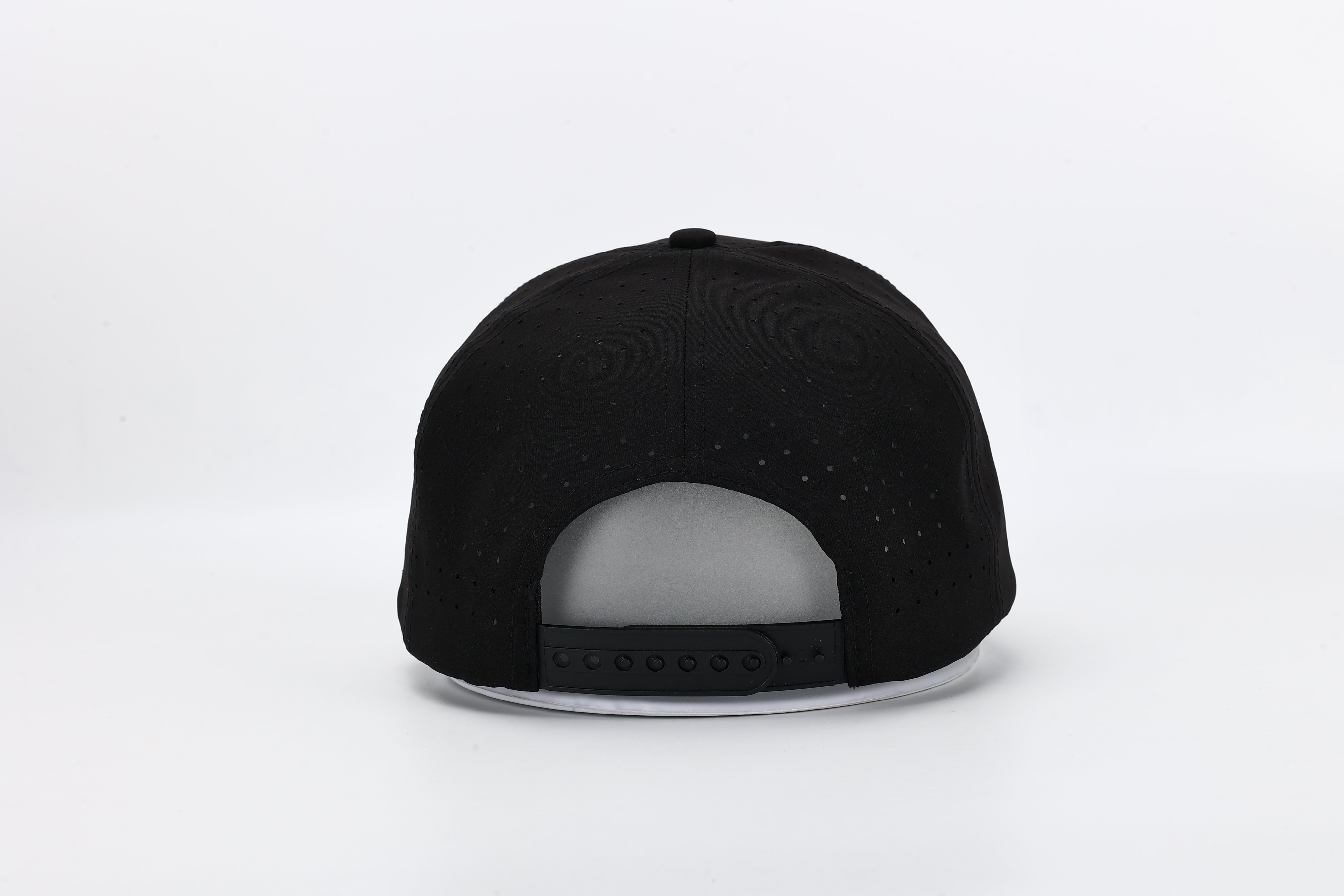 All In Wears Black Out cap in all-black performance fabric with a debossed, matching black spade logo and laser-cut ventilation.