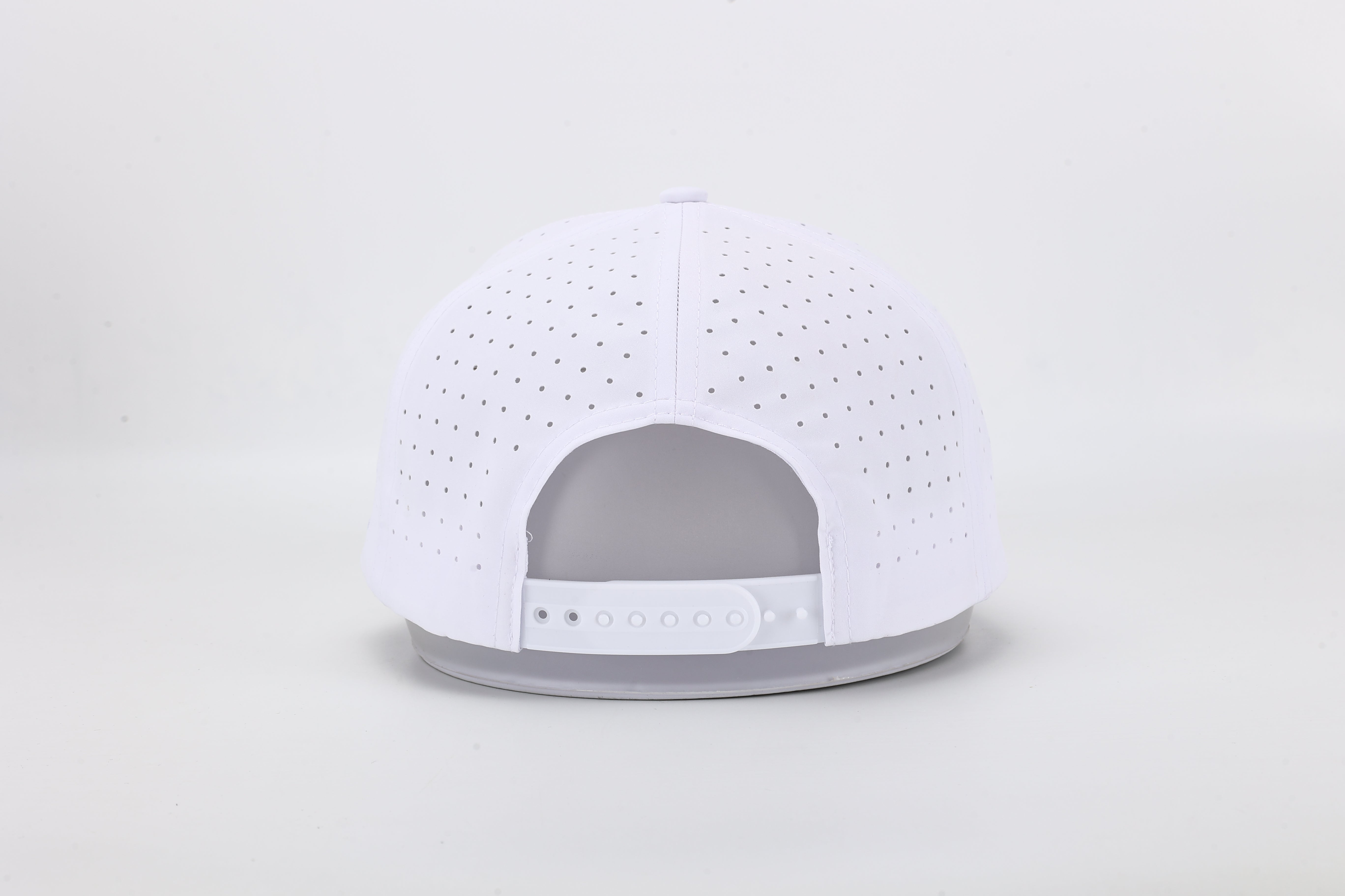 All In Wears White Out high-performance cap featuring the iconic white spade logo and laser-cut ventilation holes.