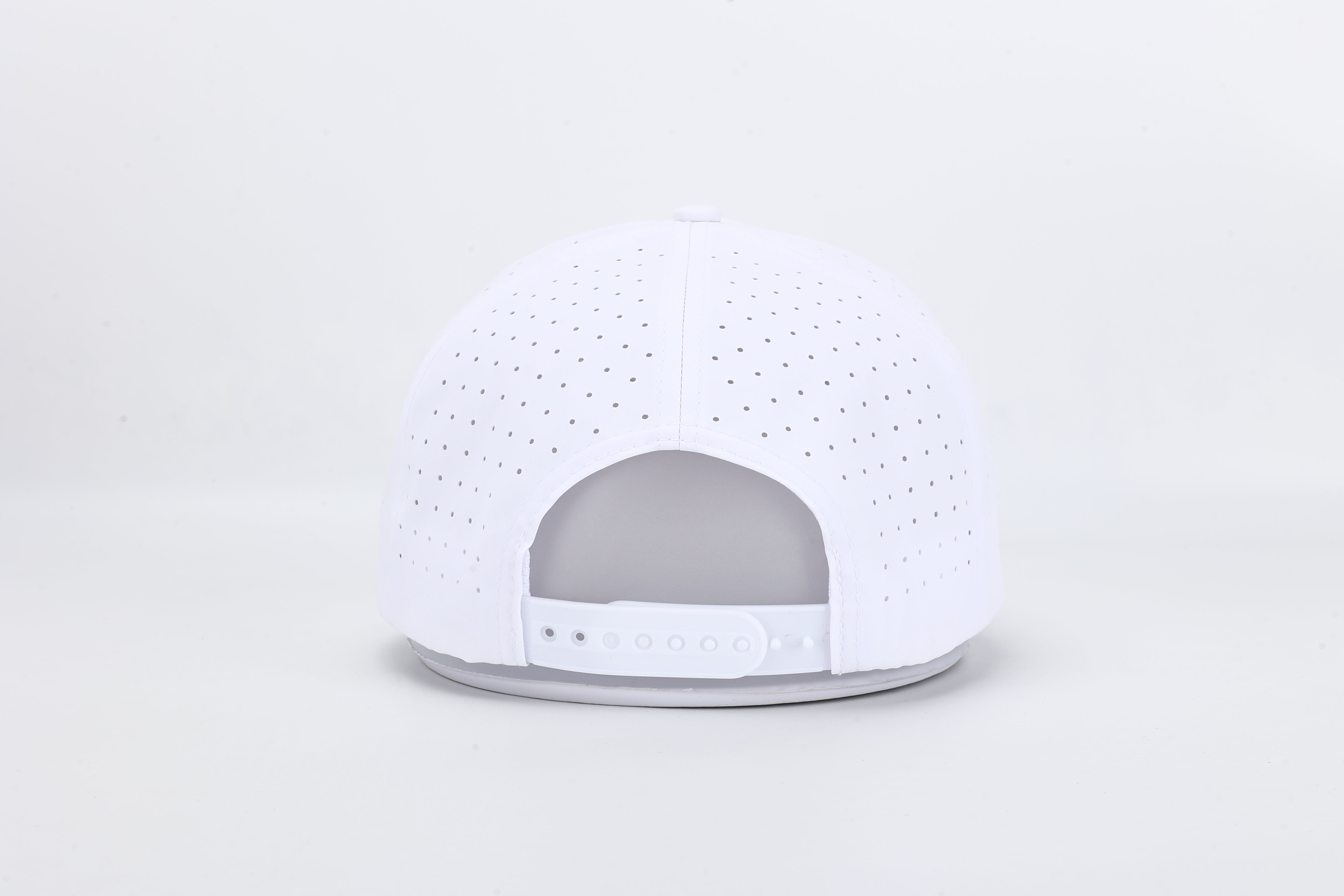 All In Wears Regal White performance cap, featuring a white body and an embroidered garnet and gold outline spade logo.