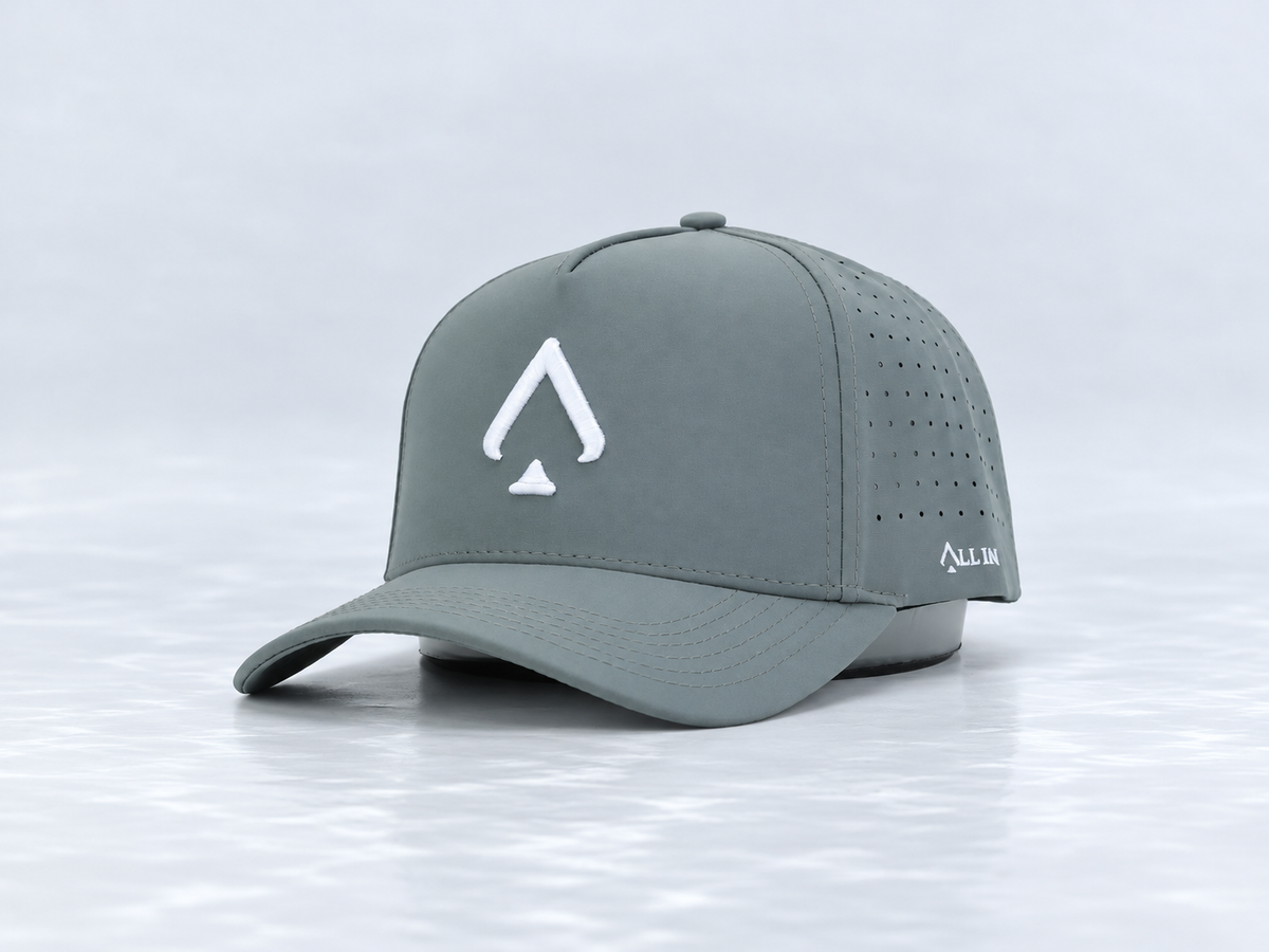 All In Lid Bloom Gray hat, three-quarter front view, in slate gray fabric with a white logo.