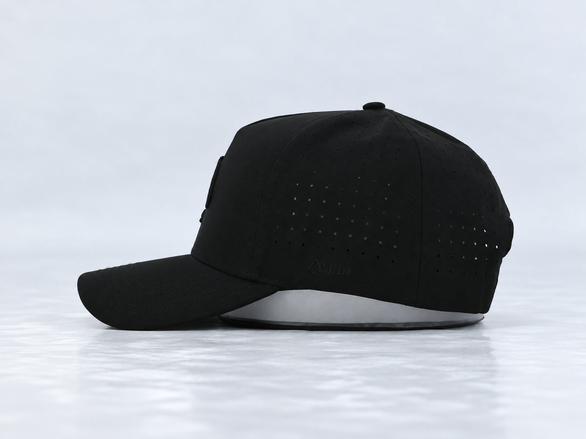 All In Lid Black Out hat, side profile, in black fabric with a tonal black logo.