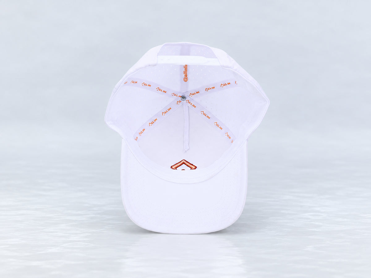 All In Lid Creamsicle hat, underside view showing the interior sweatband and lining.