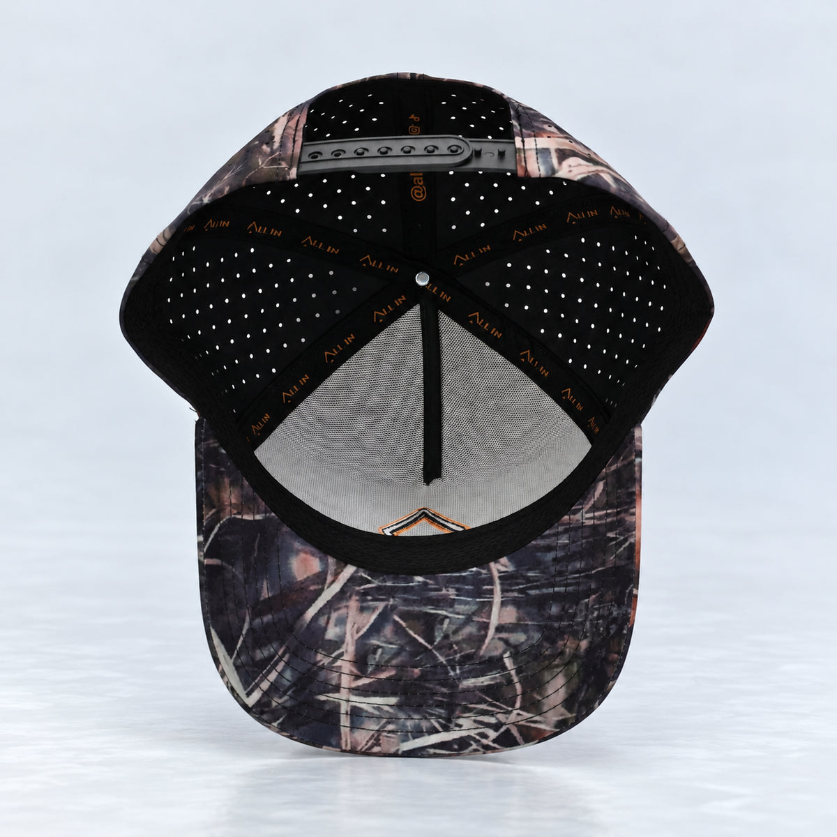 All In Lid Killa Camo hat, underside view showing the interior sweatband and lining.