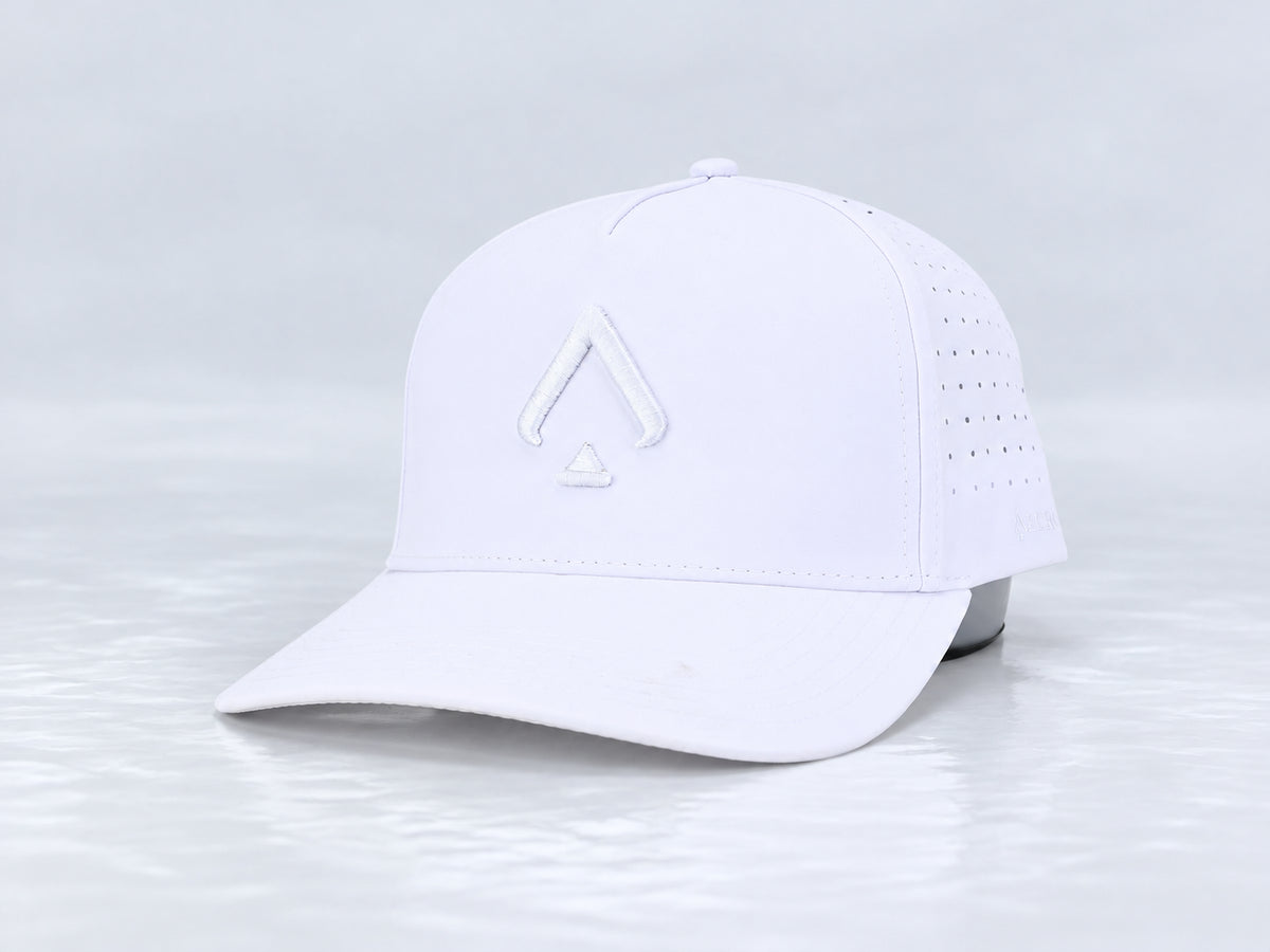 All In Lid White Out hat, three-quarter front view, in white fabric with a tonal white logo.