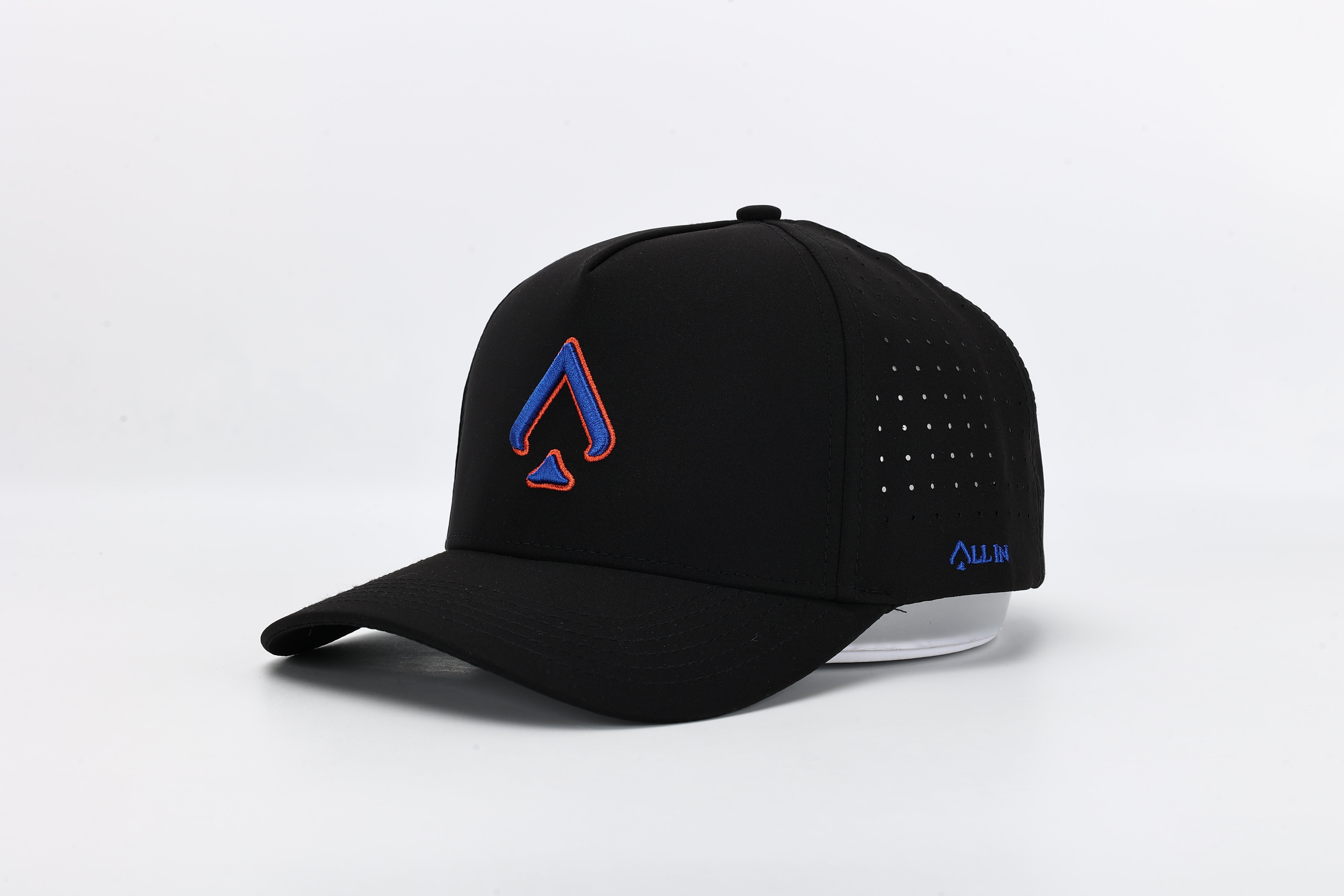 All In Wears Blackout Blaze performance cap, featuring a black body with a striking blue and orange embroidered spade logo.