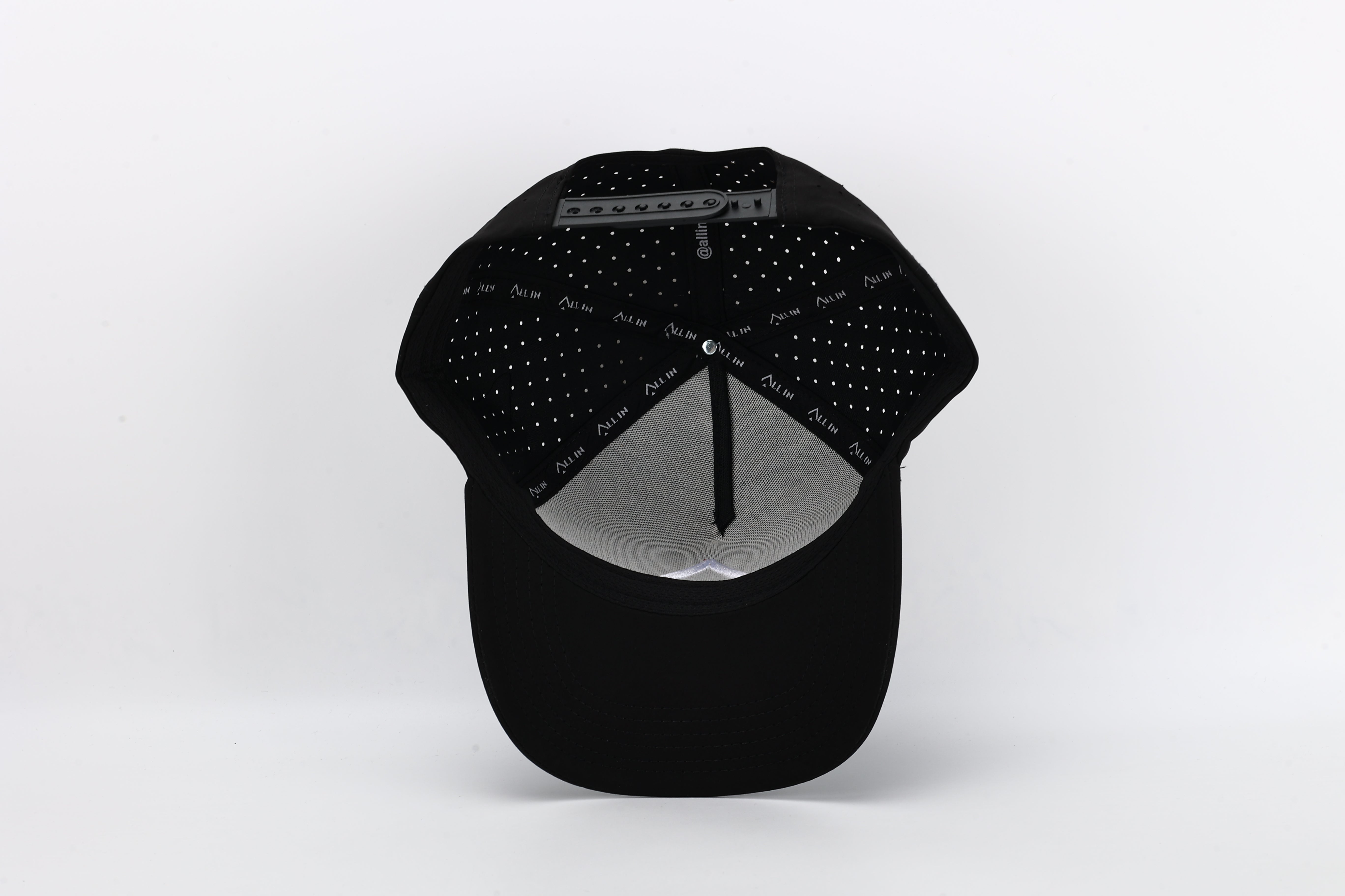 OG Black performance cap with All In logo and laser-perforated ventilation for ultimate breathability and bold style.